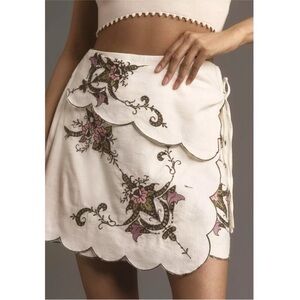 By Anthropologie embroidered floral scalloped cream wrap mini skirt